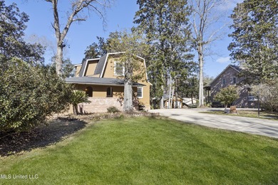 Looking for a coastal escape? This waterfront home is ideal as a on Mississippi National Golf Course in Mississippi - for sale on GolfHomes.com, golf home, golf lot