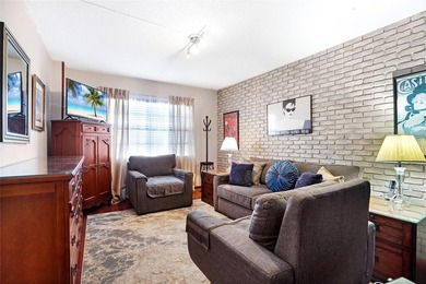 Don't miss this fantastic opportunity to live in a beautifully on Coral Ridge Country Club in Florida - for sale on GolfHomes.com, golf home, golf lot