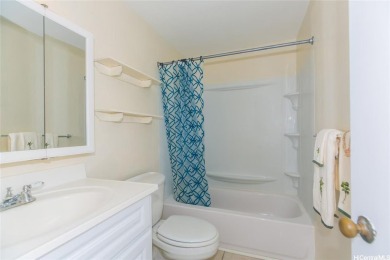 This coveted first-floor *A* unit (2BR/1BA) is ideally located on Makaha Valley Country Club in Hawaii - for sale on GolfHomes.com, golf home, golf lot