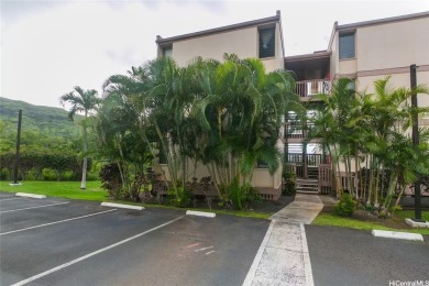 This coveted first-floor *A* unit (2BR/1BA) is ideally located on Makaha Valley Country Club in Hawaii - for sale on GolfHomes.com, golf home, golf lot