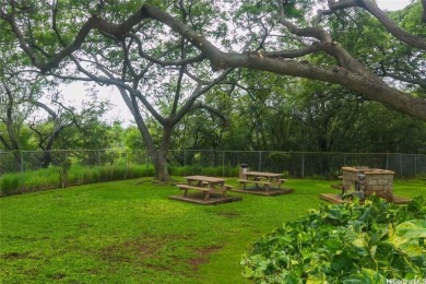 This coveted first-floor *A* unit (2BR/1BA) is ideally located on Makaha Valley Country Club in Hawaii - for sale on GolfHomes.com, golf home, golf lot