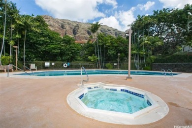 This coveted first-floor *A* unit (2BR/1BA) is ideally located on Makaha Valley Country Club in Hawaii - for sale on GolfHomes.com, golf home, golf lot
