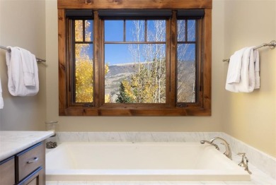 Thoughtfully designed and rich in detail, this custom home in on Raven Golf Club At Three Peaks in Colorado - for sale on GolfHomes.com, golf home, golf lot
