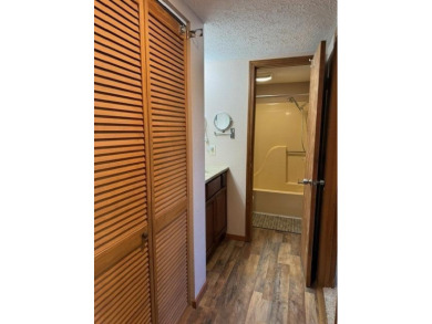 Step into luxury with this fully furnished and updated on Pointe Royale Village Country Club in Missouri - for sale on GolfHomes.com, golf home, golf lot
