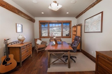 Thoughtfully designed and rich in detail, this custom home in on Raven Golf Club At Three Peaks in Colorado - for sale on GolfHomes.com, golf home, golf lot