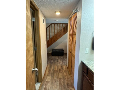 Step into luxury with this fully furnished and updated on Pointe Royale Village Country Club in Missouri - for sale on GolfHomes.com, golf home, golf lot