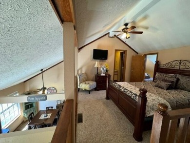 Step into luxury with this fully furnished and updated on Pointe Royale Village Country Club in Missouri - for sale on GolfHomes.com, golf home, golf lot