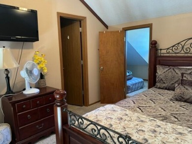 Step into luxury with this fully furnished and updated on Pointe Royale Village Country Club in Missouri - for sale on GolfHomes.com, golf home, golf lot