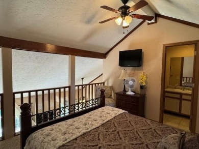 Step into luxury with this fully furnished and updated on Pointe Royale Village Country Club in Missouri - for sale on GolfHomes.com, golf home, golf lot