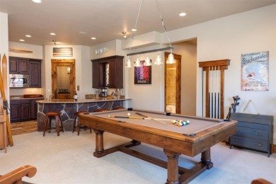 Thoughtfully designed and rich in detail, this custom home in on Raven Golf Club At Three Peaks in Colorado - for sale on GolfHomes.com, golf home, golf lot