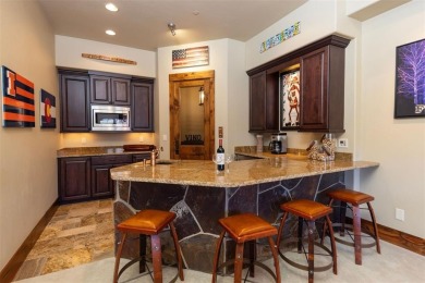 Thoughtfully designed and rich in detail, this custom home in on Raven Golf Club At Three Peaks in Colorado - for sale on GolfHomes.com, golf home, golf lot