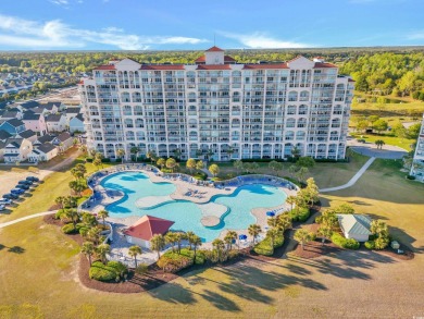 Pond and golf course views from the covered porch on this great on Barefoot Resort and Golf Club  in South Carolina - for sale on GolfHomes.com, golf home, golf lot