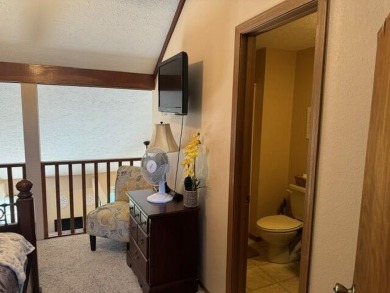 Step into luxury with this fully furnished and updated on Pointe Royale Village Country Club in Missouri - for sale on GolfHomes.com, golf home, golf lot