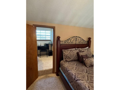 Step into luxury with this fully furnished and updated on Pointe Royale Village Country Club in Missouri - for sale on GolfHomes.com, golf home, golf lot