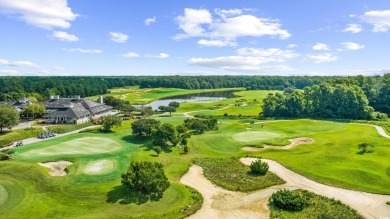 Pond and golf course views from the covered porch on this great on Barefoot Resort and Golf Club  in South Carolina - for sale on GolfHomes.com, golf home, golf lot