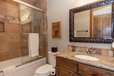 Thoughtfully designed and rich in detail, this custom home in on Raven Golf Club At Three Peaks in Colorado - for sale on GolfHomes.com, golf home, golf lot