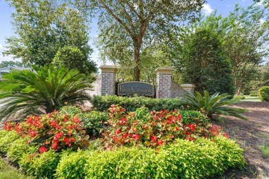 Pond and golf course views from the covered porch on this great on Barefoot Resort and Golf Club  in South Carolina - for sale on GolfHomes.com, golf home, golf lot