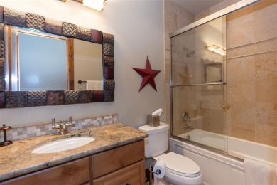 Thoughtfully designed and rich in detail, this custom home in on Raven Golf Club At Three Peaks in Colorado - for sale on GolfHomes.com, golf home, golf lot