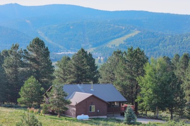 Charming 3-Bedroom Mountain Retreat with A/C!  Nestled among on Angel Fire Resort Country Club in New Mexico - for sale on GolfHomes.com, golf home, golf lot