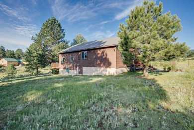Charming 3-Bedroom Mountain Retreat with A/C!  Nestled among on Angel Fire Resort Country Club in New Mexico - for sale on GolfHomes.com, golf home, golf lot