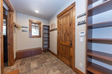 Thoughtfully designed and rich in detail, this custom home in on Raven Golf Club At Three Peaks in Colorado - for sale on GolfHomes.com, golf home, golf lot