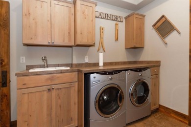 Thoughtfully designed and rich in detail, this custom home in on Raven Golf Club At Three Peaks in Colorado - for sale on GolfHomes.com, golf home, golf lot