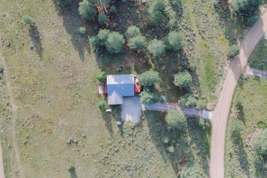 Charming 3-Bedroom Mountain Retreat with A/C!  Nestled among on Angel Fire Resort Country Club in New Mexico - for sale on GolfHomes.com, golf home, golf lot