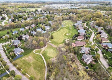 Lot 125 located on the 13th Hole of the Captain's Club Golf on The Captains Club At Woodfield in Michigan - for sale on GolfHomes.com, golf home, golf lot