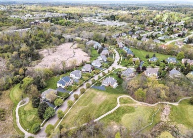 Lot 125 located on the 13th Hole of the Captain's Club Golf on The Captains Club At Woodfield in Michigan - for sale on GolfHomes.com, golf home, golf lot