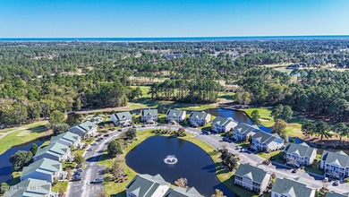 Great view of Piper Golf course in this beautiful and popular on Sandpiper Bay Golf and Country Club in North Carolina - for sale on GolfHomes.com, golf home, golf lot