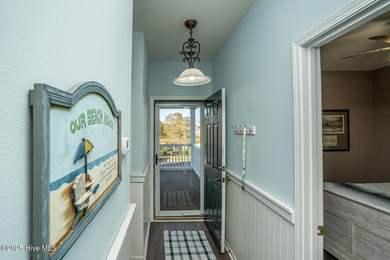 Great view of Piper Golf course in this beautiful and popular on Sandpiper Bay Golf and Country Club in North Carolina - for sale on GolfHomes.com, golf home, golf lot