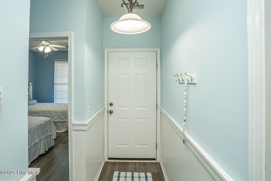 Great view of Piper Golf course in this beautiful and popular on Sandpiper Bay Golf and Country Club in North Carolina - for sale on GolfHomes.com, golf home, golf lot