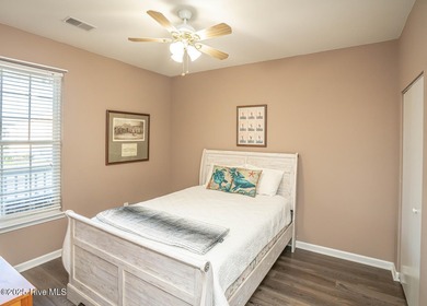 Great view of Piper Golf course in this beautiful and popular on Sandpiper Bay Golf and Country Club in North Carolina - for sale on GolfHomes.com, golf home, golf lot