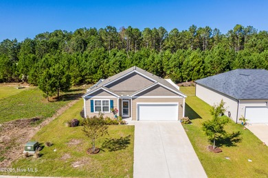 Welcome to this charming cottage with manicured landscaping on Lennon Hills Golf Course in North Carolina - for sale on GolfHomes.com, golf home, golf lot
