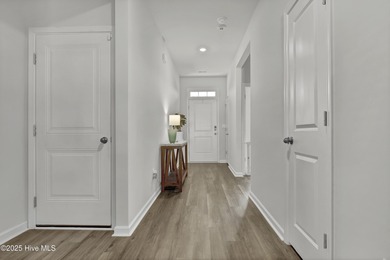 Welcome to this charming cottage with manicured landscaping on Lennon Hills Golf Course in North Carolina - for sale on GolfHomes.com, golf home, golf lot