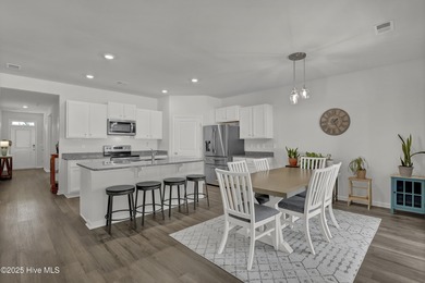 Welcome to this charming cottage with manicured landscaping on Lennon Hills Golf Course in North Carolina - for sale on GolfHomes.com, golf home, golf lot