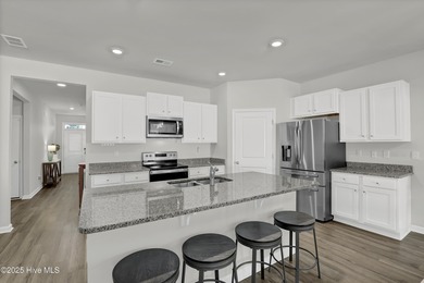 Welcome to this charming cottage with manicured landscaping on Lennon Hills Golf Course in North Carolina - for sale on GolfHomes.com, golf home, golf lot