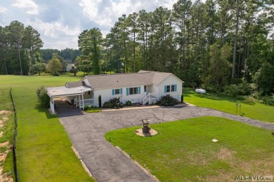 Welcome to your dream home, nestled on hole 9 of the prestigious on Tanglewood Shores Golf and Country Club in Virginia - for sale on GolfHomes.com, golf home, golf lot