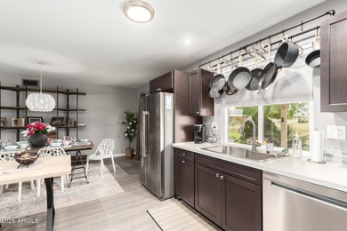 Enjoy easy living in this charming 2-bedroom Gemini home with a on Sun City Country Club in Arizona - for sale on GolfHomes.com, golf home, golf lot