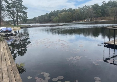 Nestled within the East Texas Piney Woods, this low maintenance on Holly Lake Ranch Golf Club in Texas - for sale on GolfHomes.com, golf home, golf lot