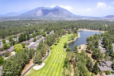 Nestled in a quiet neighborhood under the whispering pines and on Aspen Valley Golf Club in Arizona - for sale on GolfHomes.com, golf home, golf lot