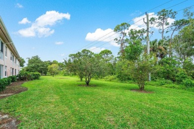 Located in the Parkside area of Little Club this first floor on The Little Club in Florida - for sale on GolfHomes.com, golf home, golf lot