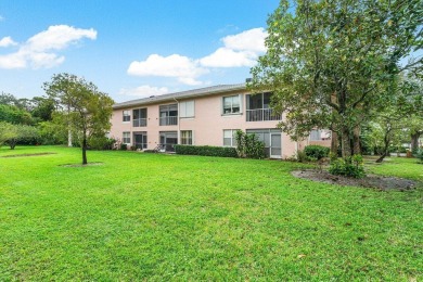 Located in the Parkside area of Little Club this first floor on The Little Club in Florida - for sale on GolfHomes.com, golf home, golf lot