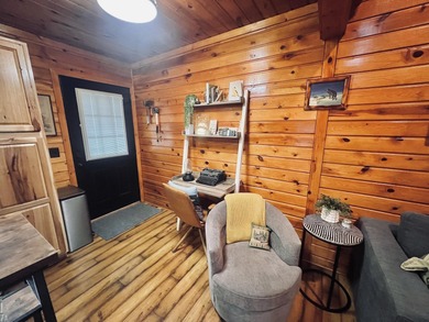 Welcome to 2344 Cabin Cove-your perfect Up North getaway without on The Loon Golf Resort in Michigan - for sale on GolfHomes.com, golf home, golf lot