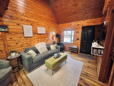 Welcome to 2344 Cabin Cove-your perfect Up North getaway without on The Loon Golf Resort in Michigan - for sale on GolfHomes.com, golf home, golf lot