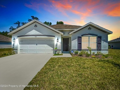 Beautifully maintained 4 bedroom, 2 bathroom home in the gated on Hernando Oaks Golf and Country Club in Florida - for sale on GolfHomes.com, golf home, golf lot