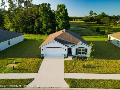 Beautifully maintained 4 bedroom, 2 bathroom home in the gated on Hernando Oaks Golf and Country Club in Florida - for sale on GolfHomes.com, golf home, golf lot