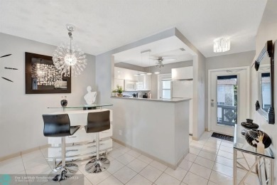 Charming 2 bedroom 2 bathroom condo located in the desirable on Inverrary Country Club in Florida - for sale on GolfHomes.com, golf home, golf lot