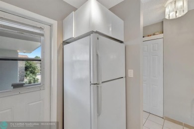 Charming 2 bedroom 2 bathroom condo located in the desirable on Inverrary Country Club in Florida - for sale on GolfHomes.com, golf home, golf lot
