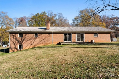 This full brick ranch home featuring 3 bedrooms, 2 full on Club At Irish Creek in North Carolina - for sale on GolfHomes.com, golf home, golf lot